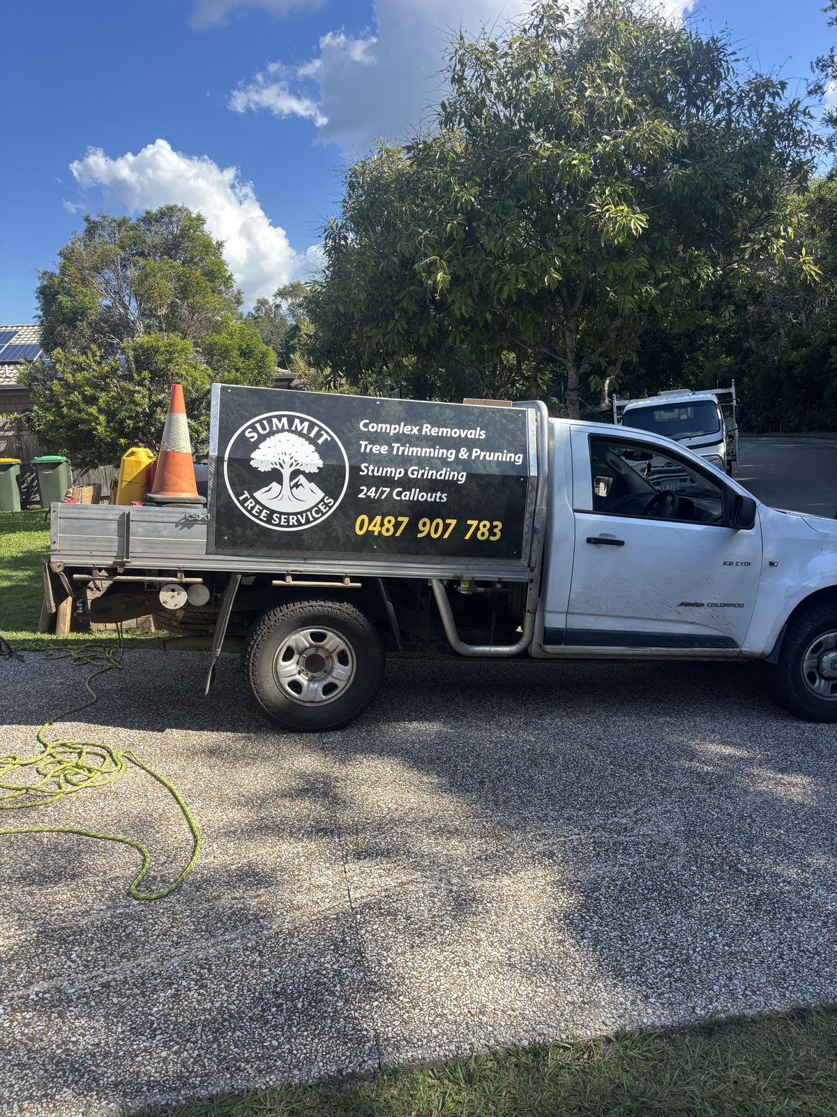 Summit Tree Services truck on site